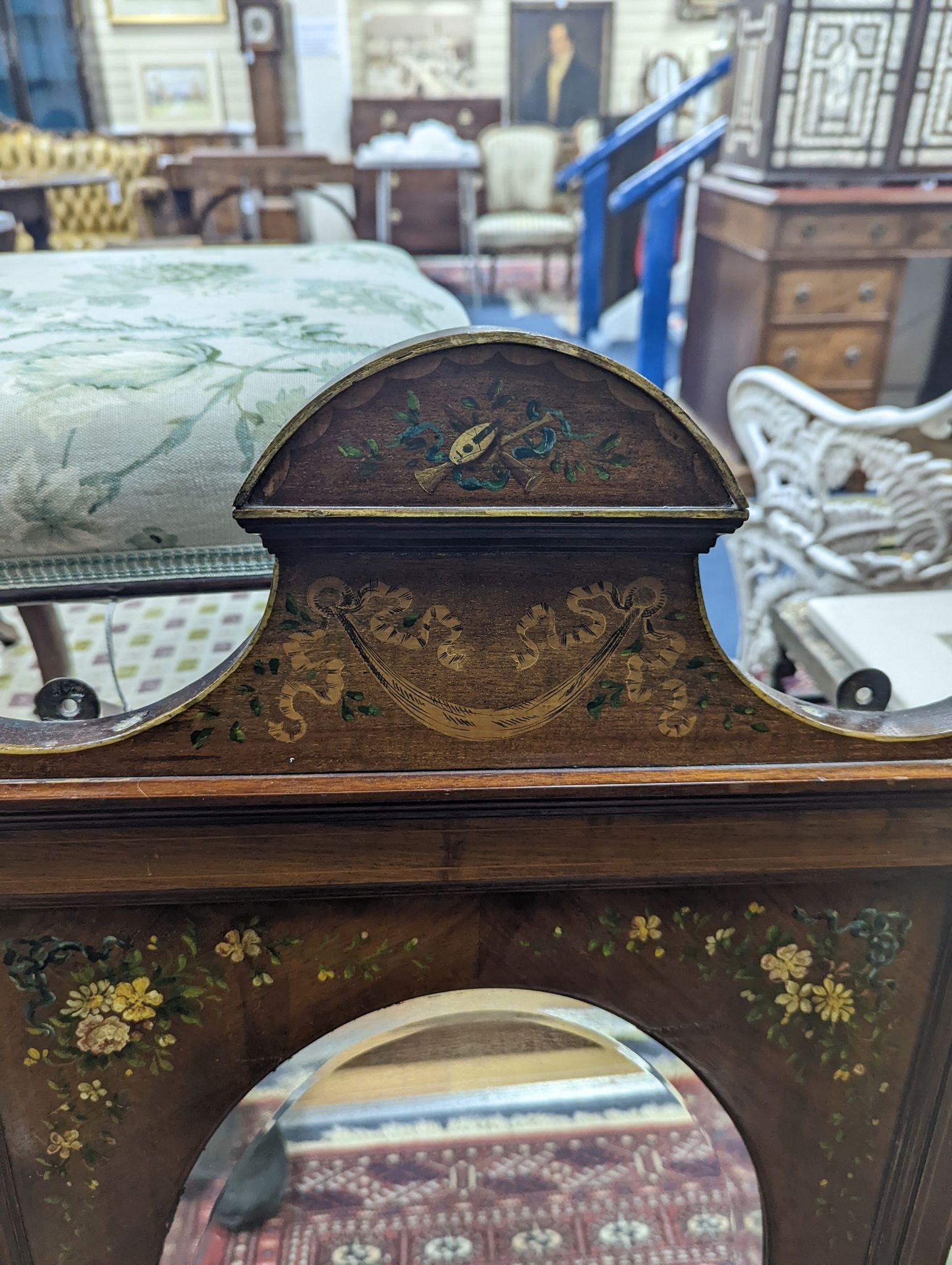 An Edwardian floral painted rectangular inlaid walnut wall mirror, with oval plate, width 50cm, height 91cm